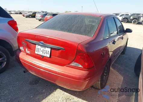 2003 Ford Focus Lx z USA, uszkodzony, nr VIN 1FAFP33P03W343530